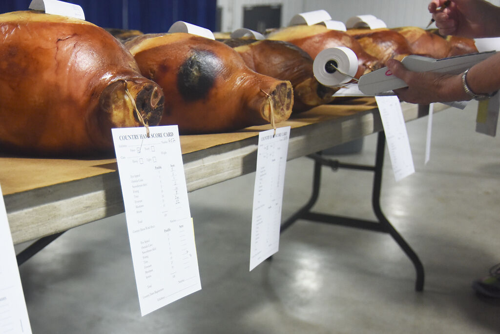 Linda Lynn totals the points on the sugar cured ham (copy)